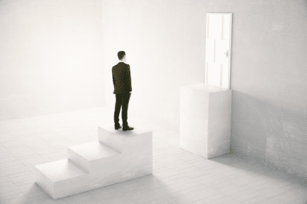 Businessman standing on steps, highlighting missing account management concept.