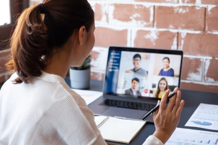 Businesswoman in video meeting.